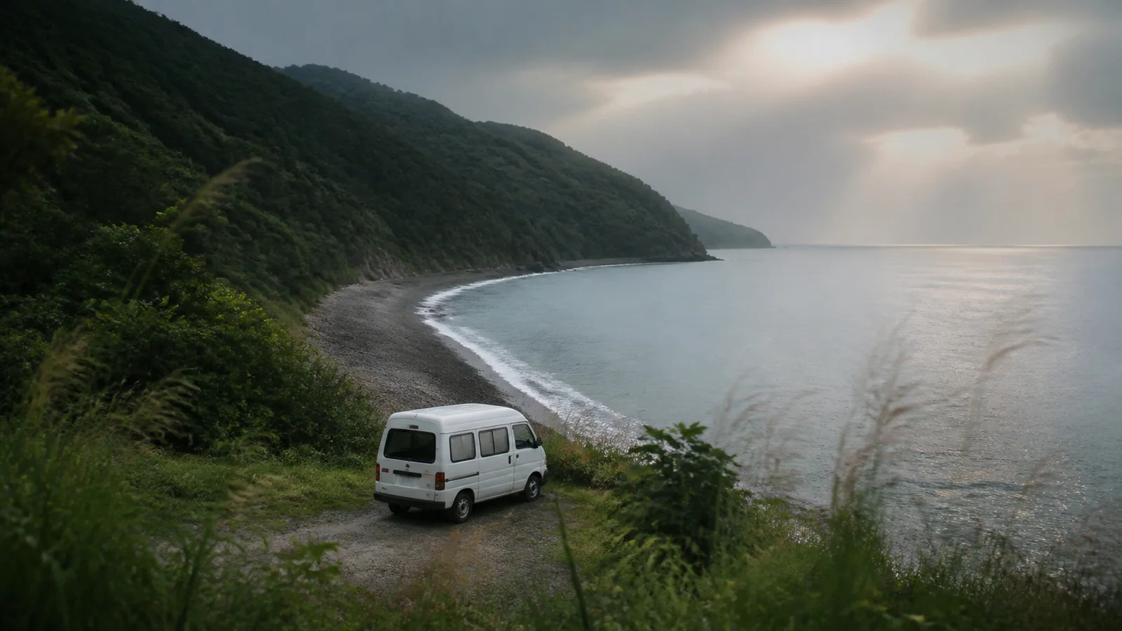 Campervan above a quiet Black Sea beach in Georgia