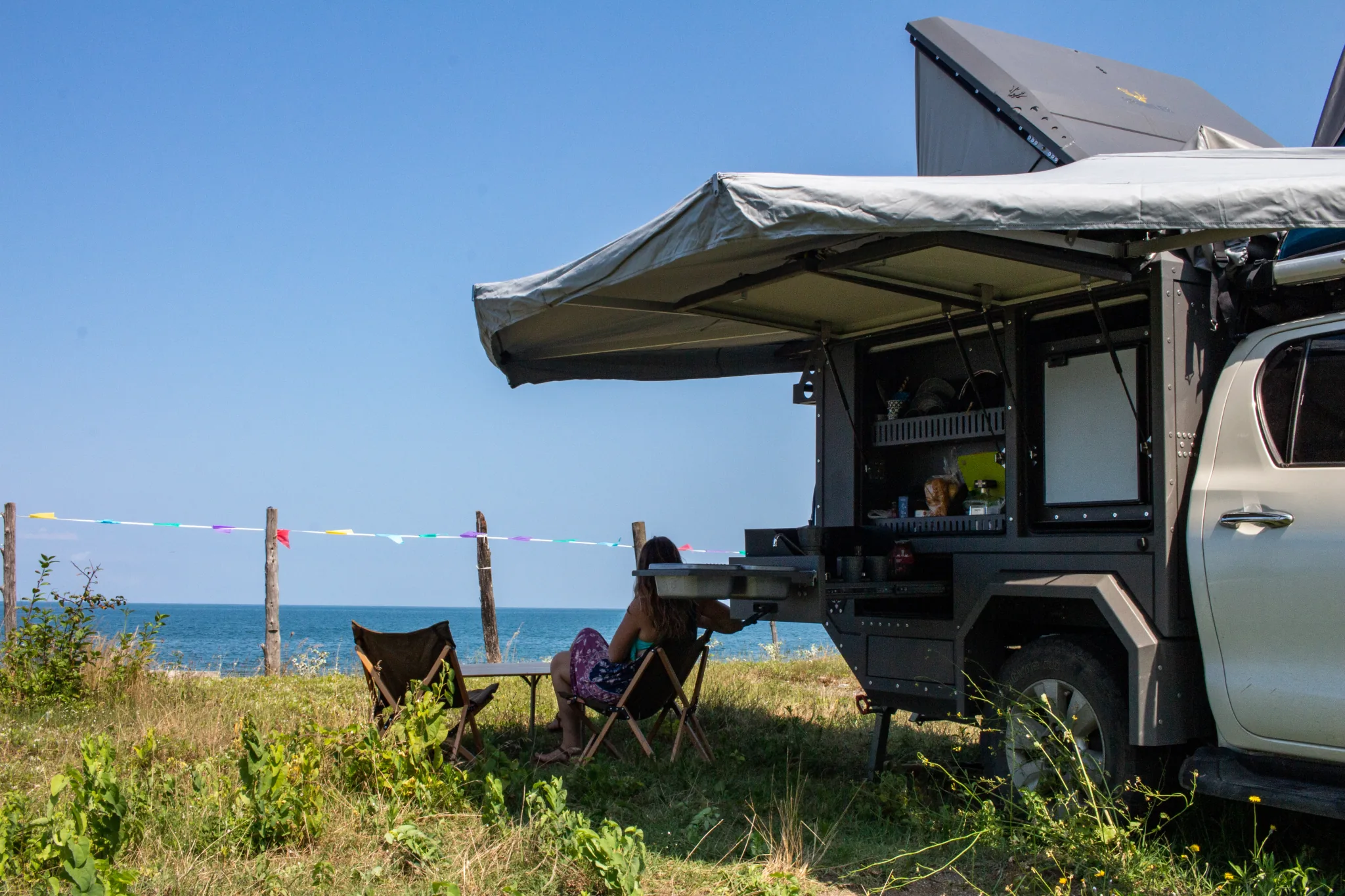 Overlando Toyota Hilux 4x4 Expedition Camper, open photo 3